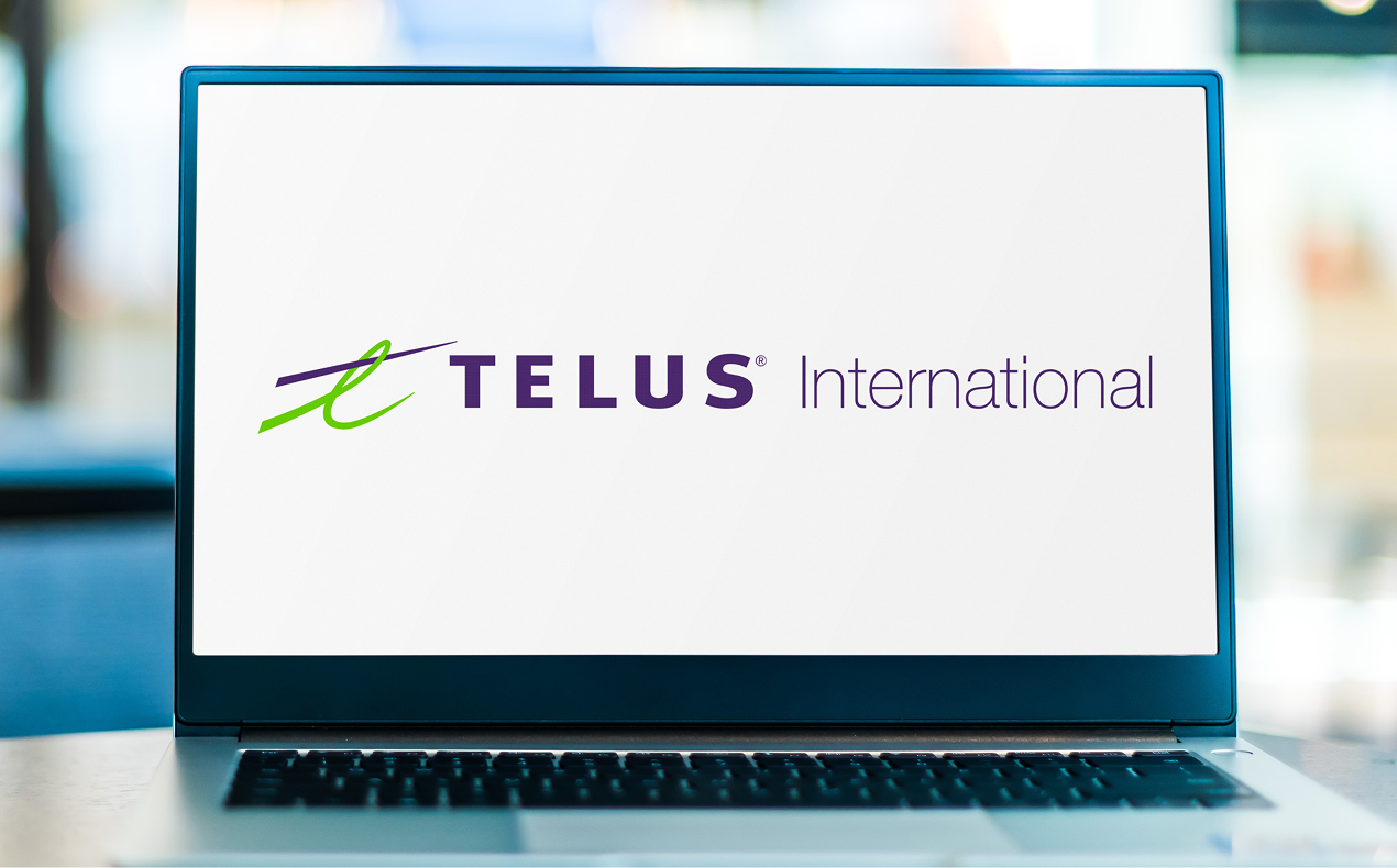 Image of Telus International logo on a laptop screen